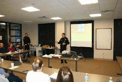 Officer speaking to a classroom